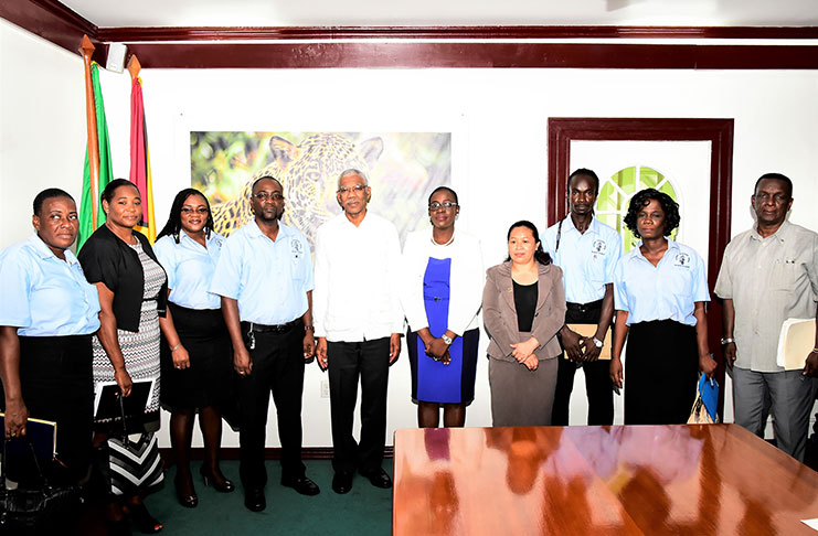President David Granger and Education Minister, Ms Nicolette Henry (fifth and sixth left respectively) with GTU representatives following their meeting at State House on Monday