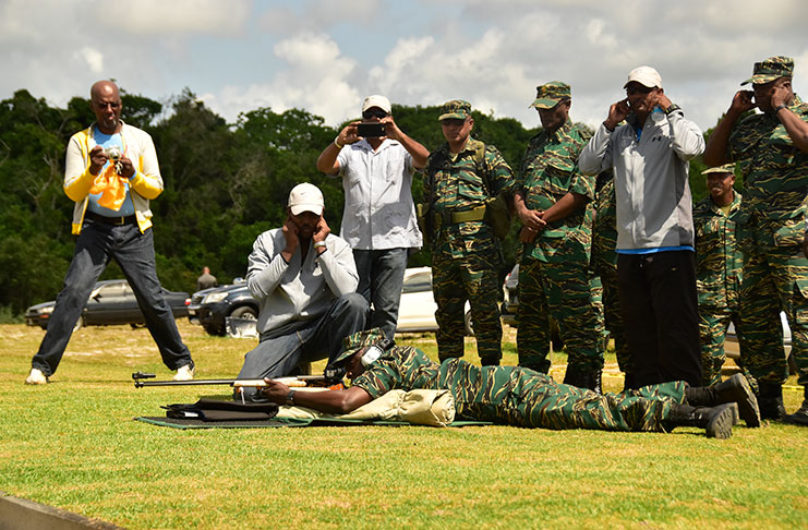Brigadier Patrick West, president of the GuyanaNRA fires off the opening shot of the West Indies Full Bore Shooting Council Championships and the NRA’s 150th Anniversary celebrations. (Adrian Narine photo)