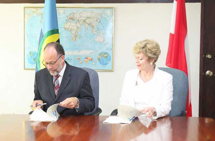 Flashback: Ambassador Colin Granderson (left)