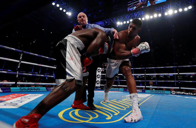 Joshua stops Takam in 10th to retain heavyweight crowns - Guyana Chronicle