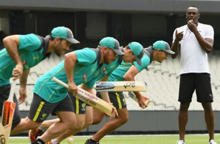 Usain Bolt  giving sprinting tips to the Aussie batsmen