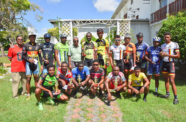 Prize winners of the various categories of the Diamond Mineral Water 60-mile cycle road race which was staged yesterday, strike a pose for photographer Samuel Maughn.