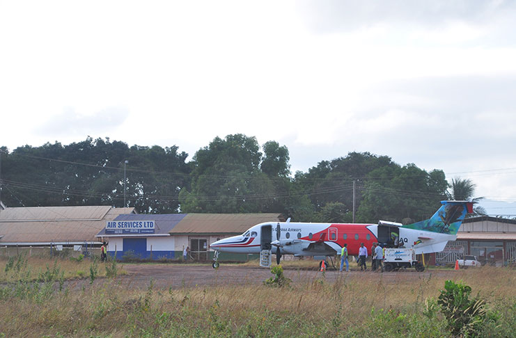 A Trans Guyana Airways aircraft lands at the Lethem airstrip in October (Delano Williams photo)