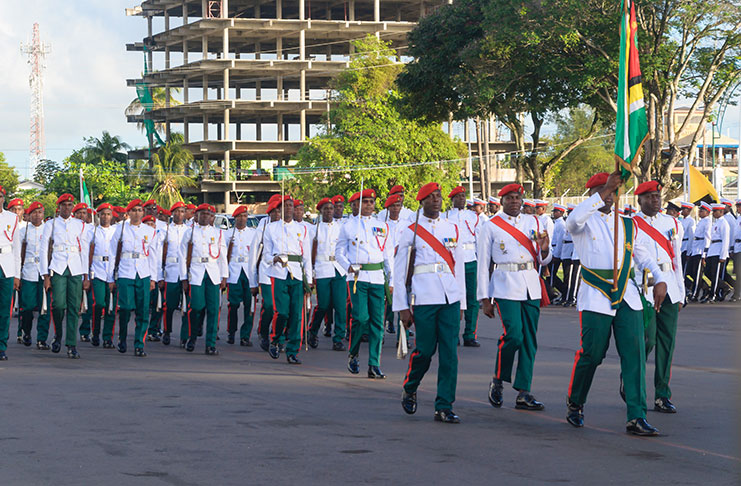Soldiers parade on the Drill Square at Camp Ayanganna during a medal ceremony on Tuesday (Delano Williams photo)
