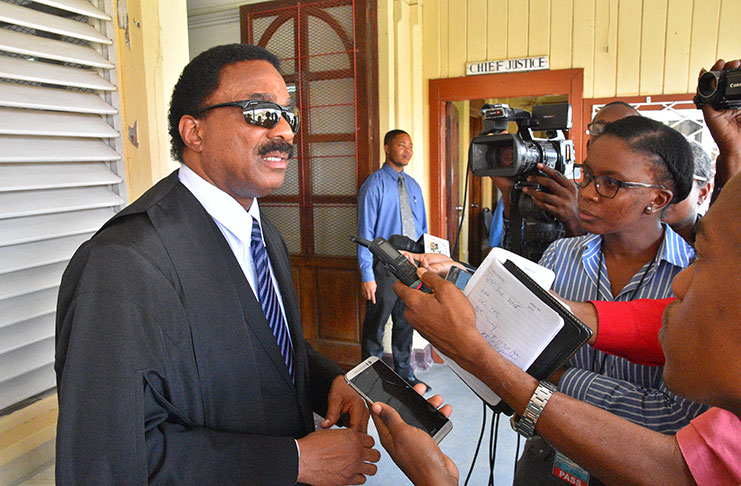 Attorney General, Basil Williams speaks with reporters Thursday