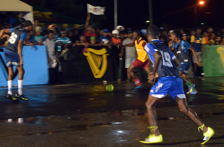 Part of the action in the Guinness Street football tournament at the National Cultural Centre tarmac.