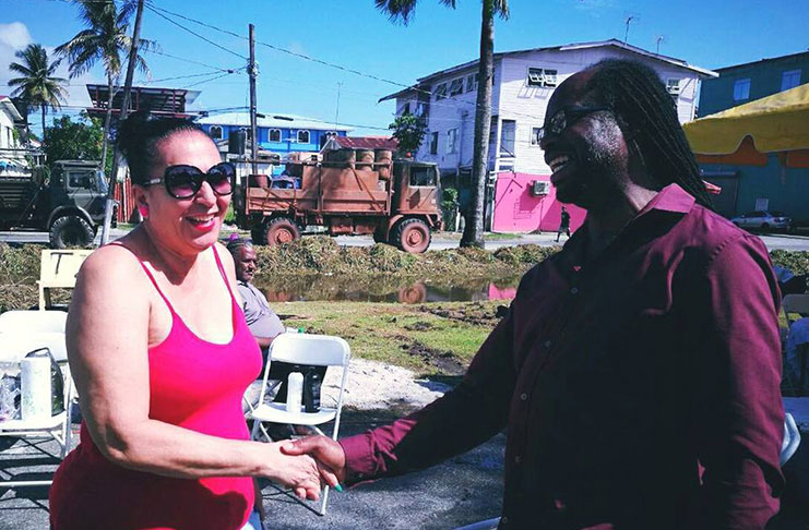 City Mayor Patricia Chase-Green greets Pastor Timothy King