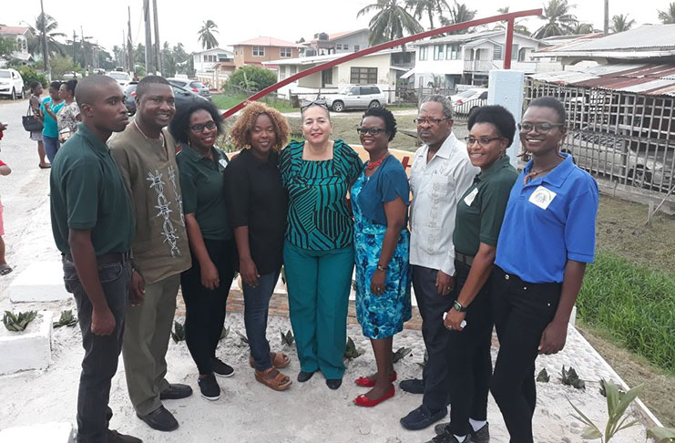 Posing with the ‘Fabulous Group of Five’ is Mayor Patricia Chase Green (at centre).  On her left is lecturer, Debbie Hopkinson and Vice Chancellor Ivelaw Griffith.   Second from left is P.S.  Reginald Brotherson along with students (from left)  Joumal Johnson, Ashanti Jasper, Kimberly Conway, Shelisa Comacho-Khan and Marcia Khan.