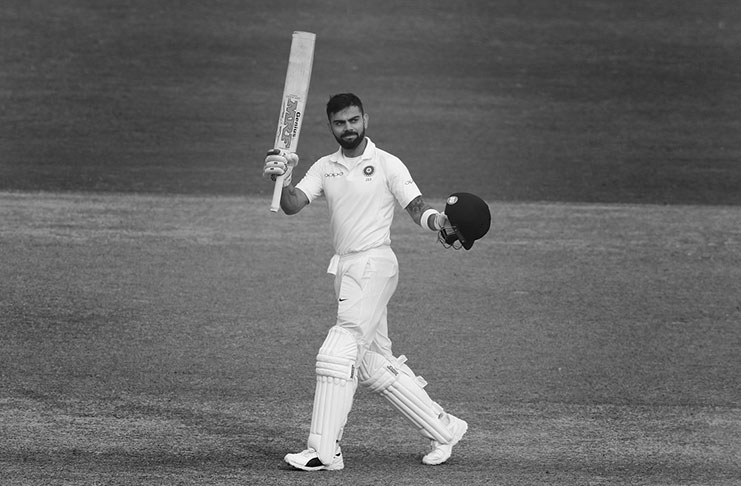 Virat Kohli acknowledges the Kotla's applause after his 20th Test century ©BCCI