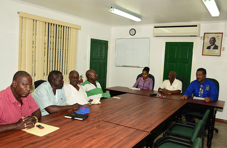 Minister within the Ministry of Social Protection with responsibility for Labour, Keith Scott, and the Chief Labour Officer Charles Ogle (at the head table), meeting with GB&GWU  General-Secretary, Lincoln Lewis, GB&GWU President Leslie Gonsalves, and trade unionists Emilton McCalmont and Wayne Coppin