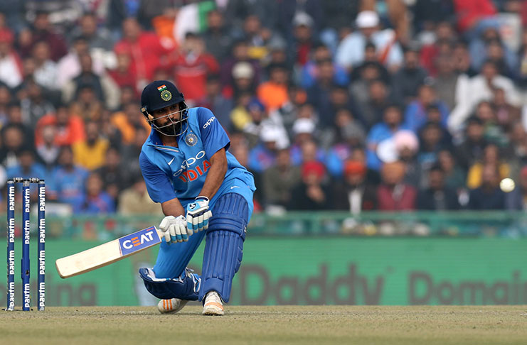 Rohit Sharma gets into position for a lap-sweep. (ESPNCricinfo photo)