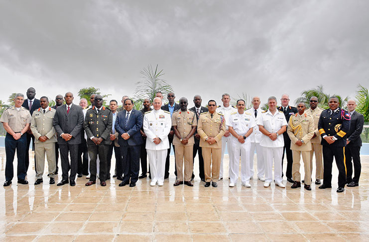 Prime Minister Moses Nagamootoo with some members of the CANSEC delegation during a photo op