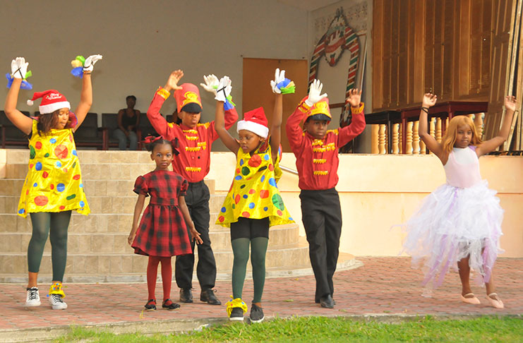 Children perform at the Rotaract Club of Georgetown annual Christmas
cheer at the Indian Monument Gardens on Saturday (Adrian Narine photo)