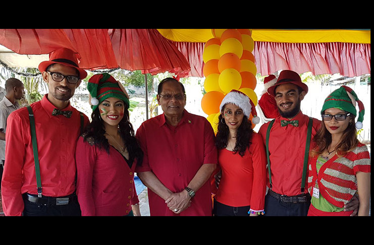 Prime Minister Moses Nagamootoo and members of the Chinese medical brigade at the Courtland children’s party 