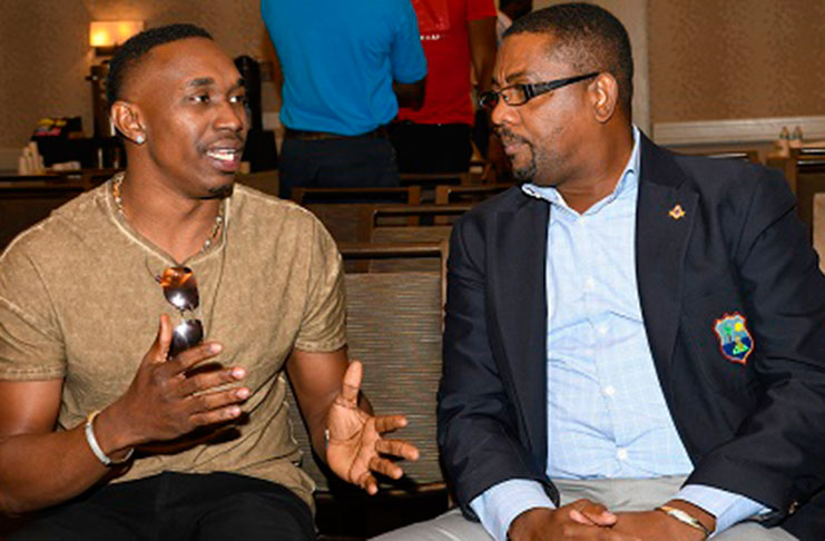 FLASHBACK: All-rounder Dwayne Bravo (left) chats with CWI president Dave Camero, during a players’ forum in Fort Lauderdale two years ago.