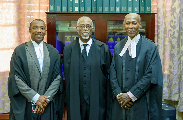 (from left) Attorney-at-Law, Ralph A. Thorne; Justice James Bovell Drakes and Attorney-at-Law, Hal Gallop (Photo by Samuel Maughn)