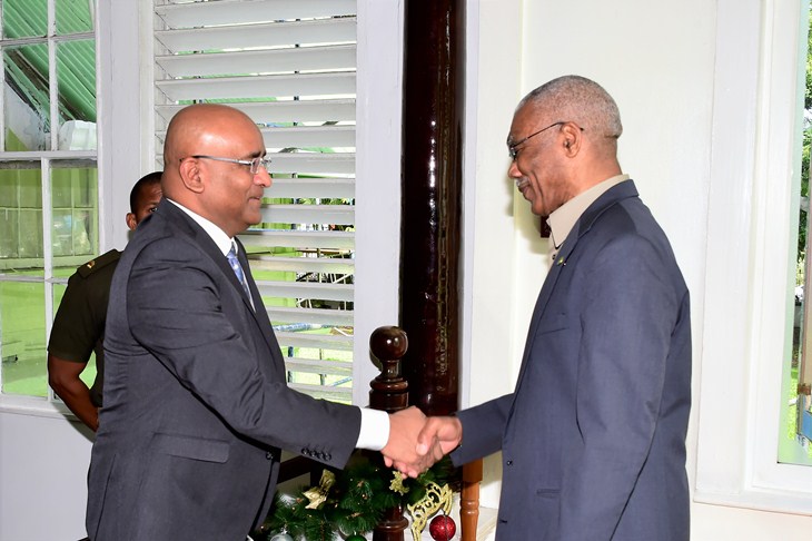 President David Granger greets Opposition Leader,  Bharrat Jagdeo upon his arrival at State House.(MoTP photo)