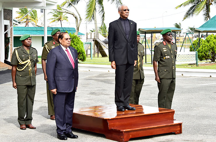 President David Granger takes the salute flanked by Prime Minister Moses Nagamootoo and Chief-of-Staff of the Guyana Defence
Force, Brigadier Patrick West (Ministry of the Presidency photo)