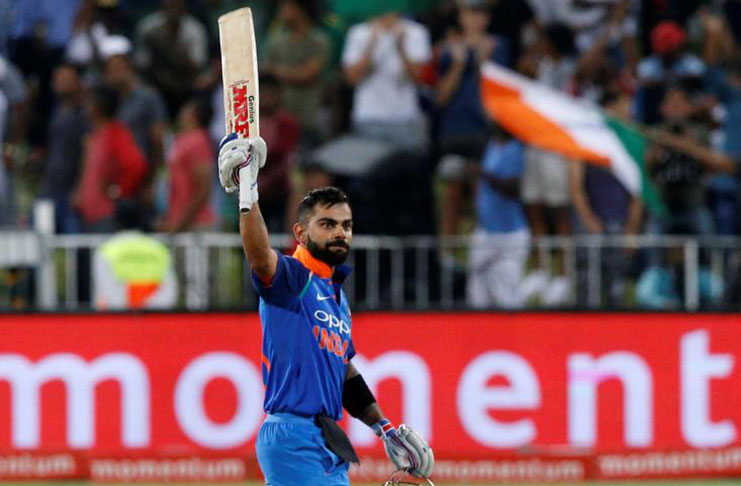 India's Virat Kohli celebrates scoring a century. REUTERS/Rogan Ward