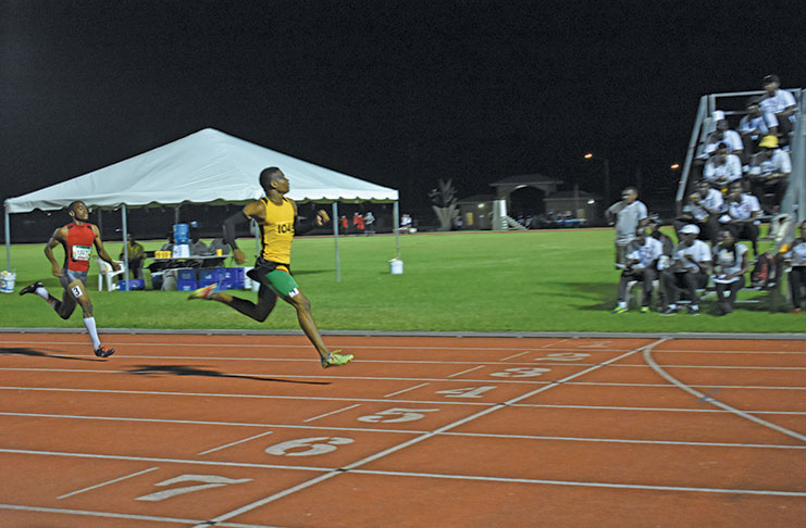 Daniel Williams books his 400m spot at the CARIFTA Games on Sunday at the National Track and Field Centre, Leonora.