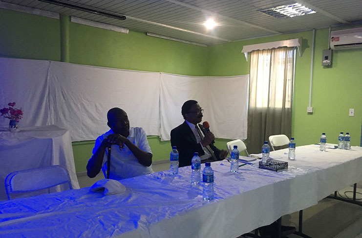 Minister of Legal Affairs and Attorney General Basil Williams fielding questions from the audience. Also in picture is former Mayor of Corriverton, Everett Heywood