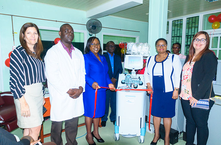 The new apheresis machine is commissioned at the Georgetown Public Hospital Corporation. From left are Regional Manager of Isla Lab, Sandra Vega; Director of the National Blood Transfusion Service (NBTS), Dr Pedro Lewis; Minister within Ministry of Public Health, Dr Karen Cummings; Minister of Public Health, Volda Lawrence and Isla Lab Product Specialist, Lizmariel Vega (Photo by Delano Williams)