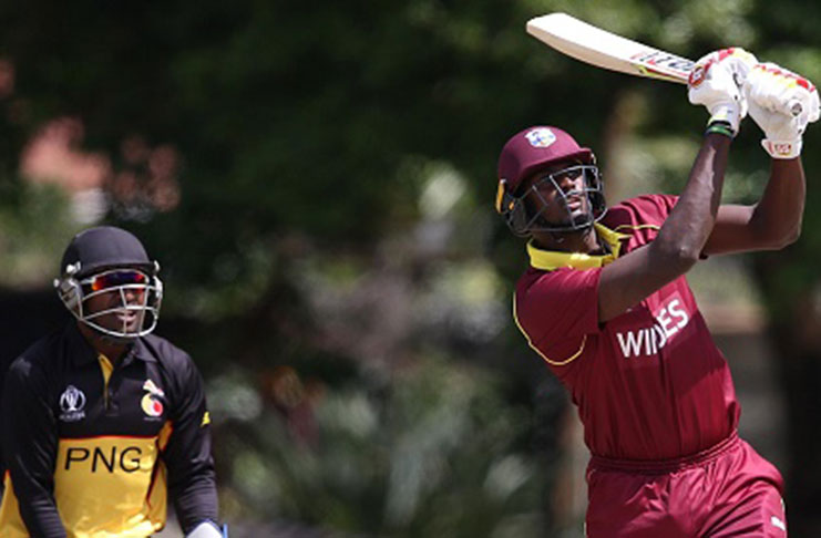 Captain Jason Holder hits out during his unbeaten 99 against PNG yesterday. (Photo courtesy ICC)