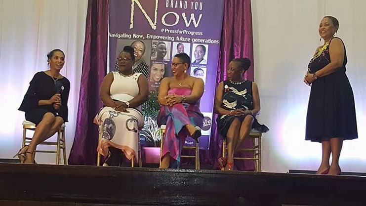 The speakers during a Q&A session