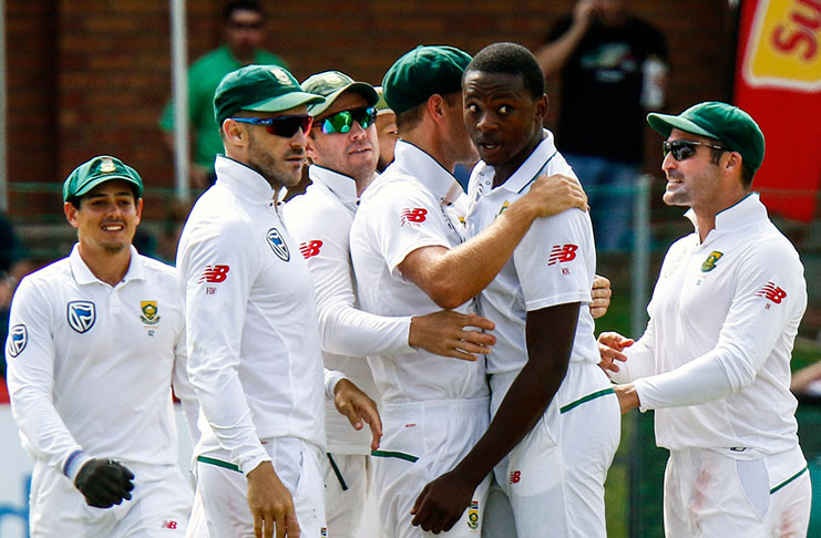 Kagiso Rabada celebrates a wicket with his team-mates   (Associated Press)