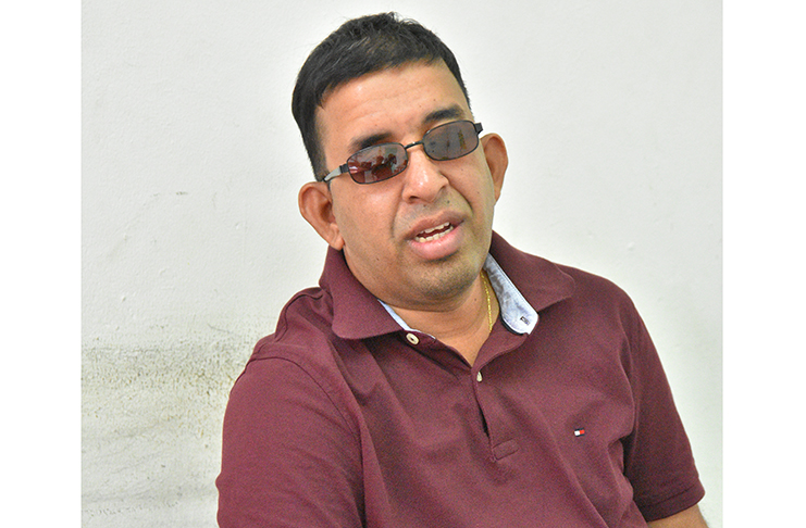 Project Coordinator of the CXC programme at the Guyana Society for the Blind, Ganesh Singh, calls for the implementation of programmes which rehabilitate and reintegrate visually impaired persons into society (Photo by Samuel Maughn)