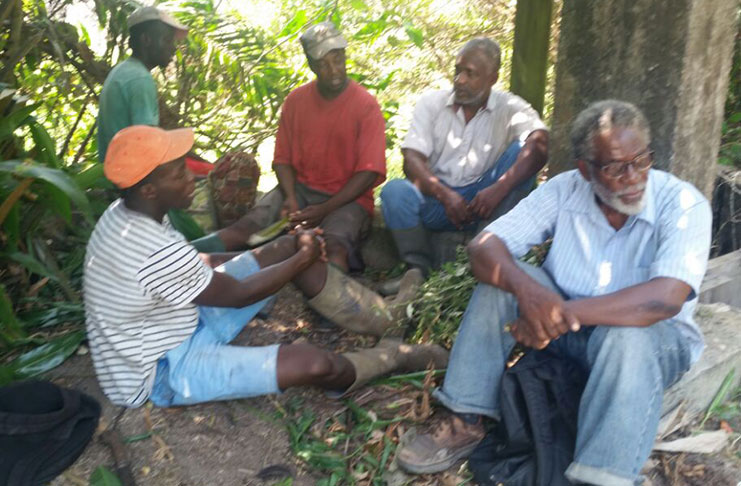 Errol Luke (in spectacles) with some farmers in Victoria