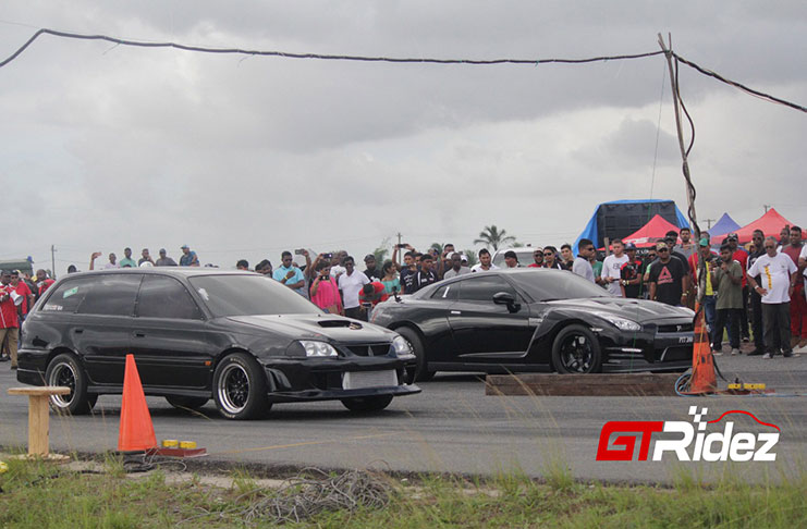 Shawn Persaud (left) and Team Mohamed’s Enterprise GTR Goliath defended Guyana’s turf at King of the Strip 2