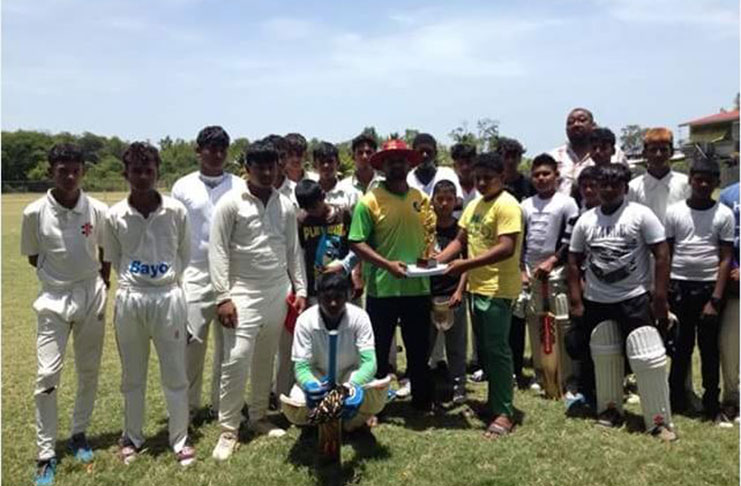 RHTYSC Asst. Secretary, Simon Naidu, makes a donation to the MYO and No. 73 Cricket teams