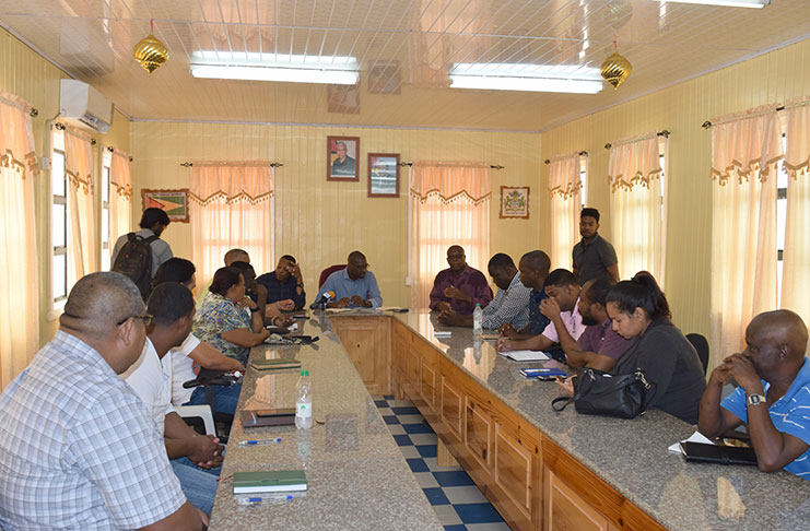 Minister of Public Infrastructure David Patterson meeting with local and regional officials in Bartica