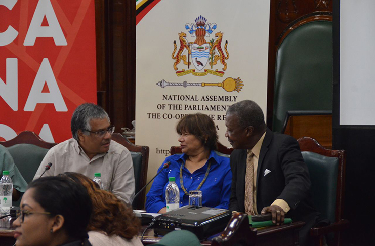 ACM Executive Wesley Gibbings; Canadian High Commissioner, Lilian Chatterjeee; and Speaker of the National Assembly, Dr. Barton Scotland in a discussion ahead of the opening ceremony of the training programme