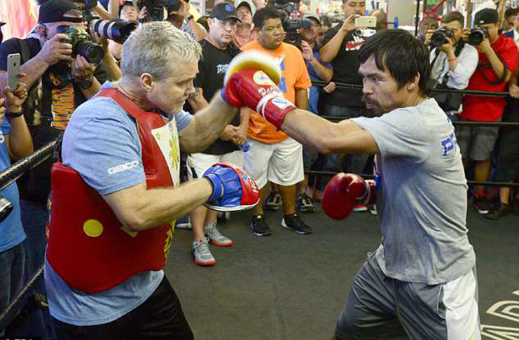 Manny Pacquiao preparations may not involve long-time trainer Freddie Roach.