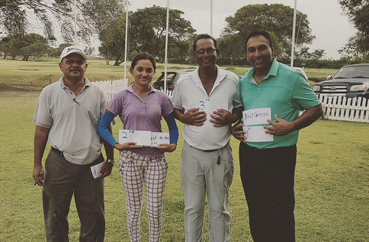 Winners pose outside the Clubhouse with the Captain. From left; - Captain Chen Deo, Joaan Deo, Patrick Prashad and Club President Aleem Hussain.