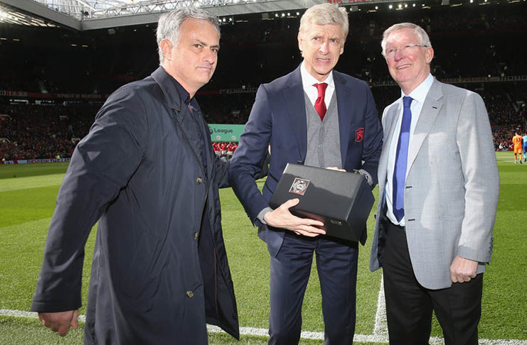 Arsene Wenger (centre)  was presented with a gift before the match  by Sir Alex Ferguson and Jose Mourinho.(Daily Express)