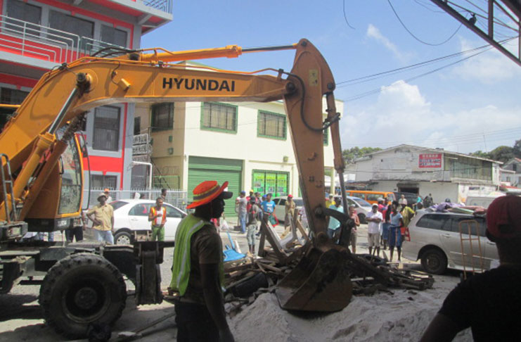 The City Council swooped down with its ‘hymac’ to remove vendors on Alexander Street.