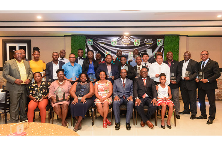 Recipients and Executive Members of the GFF following the conclusion of the Federation’s Awards at the SleepIn Hotel and Casino on Friday evening. (Delano Williams photos)
