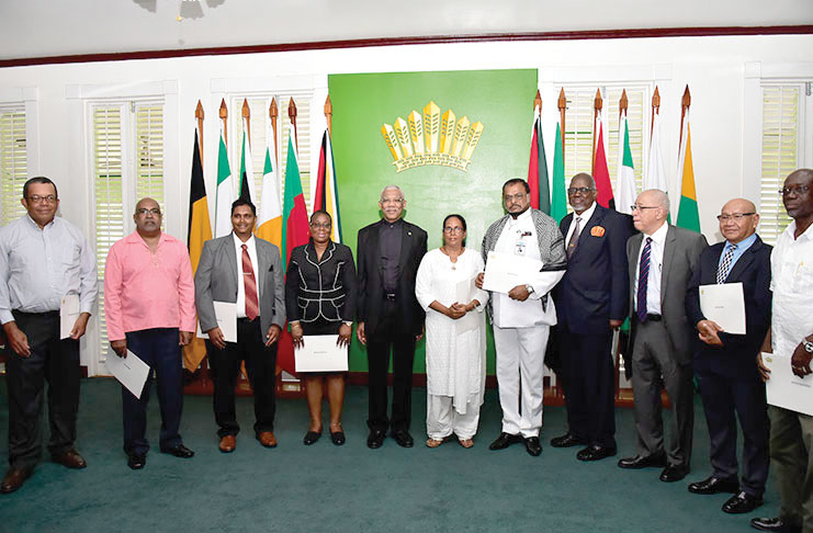 President David Granger flanked by the newly-appointed members of the Ethnic Relations Commission (ERC)
