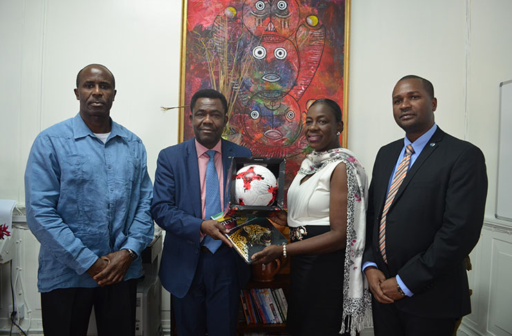 FIFA official Mosengo-Omba during a courtesy call on Minister Nicolette Henry in February 2017 in the presence of president Wayne Forde (right) and First vice-president Brigadier (Ret.) Bruce Lovell