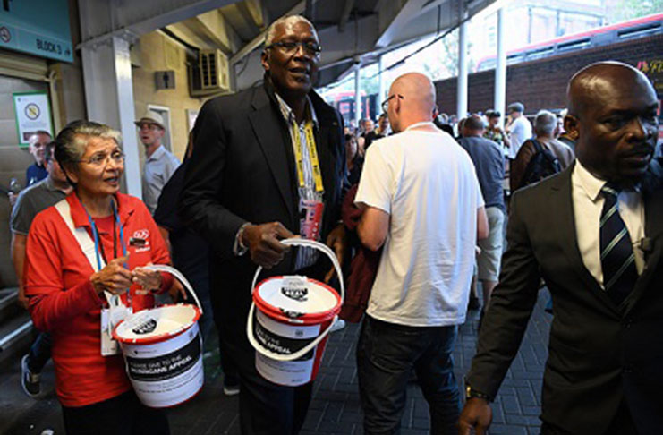 Fast bowler legend Joel Garner (second from left) pictured here last September raising funds for hurricane relief at the Oval in London.