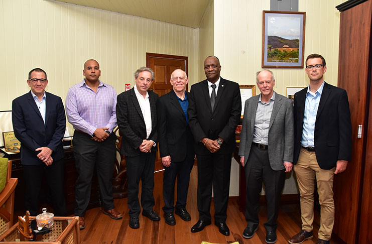 From Left: Mr. Brud Drachman, Executive Vice President, PriceSmart Incorporated, Mr. Andron Alphonson, the local contact, Mr. Leon Janks, Board Member, PriceSmart, Minister of State, Mr. Joseph Harmon, Mr. Robert Price, Founder and Chairman of the Board of Directors and Mr. David Price, President of PriceSmart Incorporated during the meeting today.
