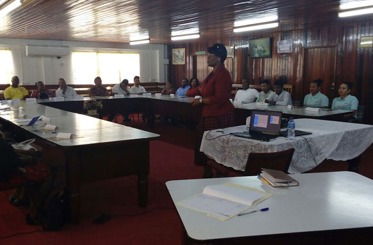 Persons being educated on how to improve hospitality services in Region Two