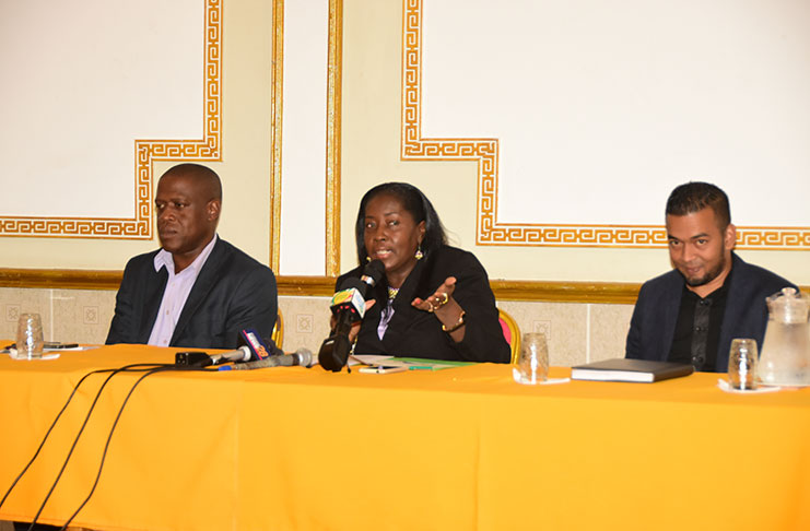Seated at the head table, from left, are Chief Executive Officer of CHPA Lelon Saul, Minister within the Ministry of Communities Valerie Adams-Yearwood, and Project Director Omar Narine.