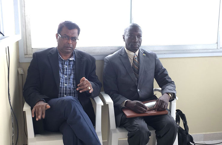 Public Security Minister Khemraj Ramjattan and Guyana’s Ambassador to Suriname Keith George at the meeting with  survivors and relatives of victims of the deadly pirate attack on Sunday