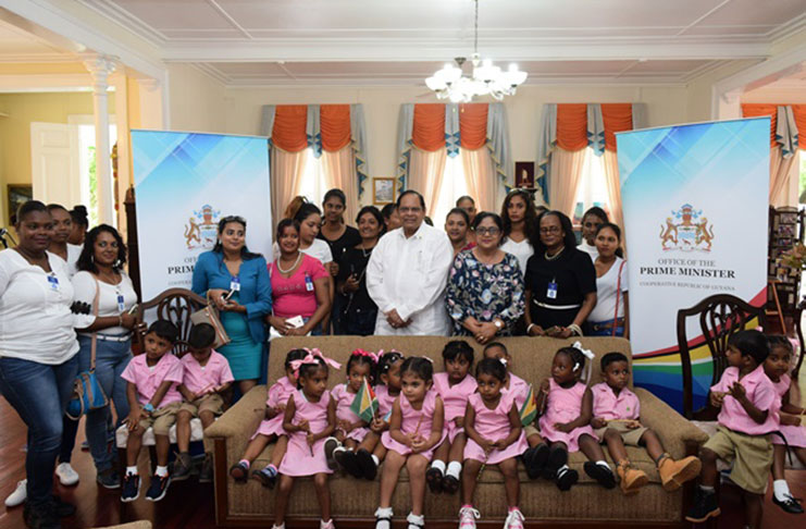 Prime Minister, Hon. Moses Nagamootoo and Mrs Sita Nagamootoo with teachers, parents and students of the Little Angels Play Group