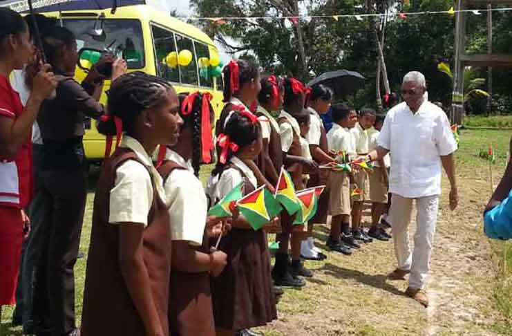 President David Granger meeting with the children during the commissioning ceremony in 2016