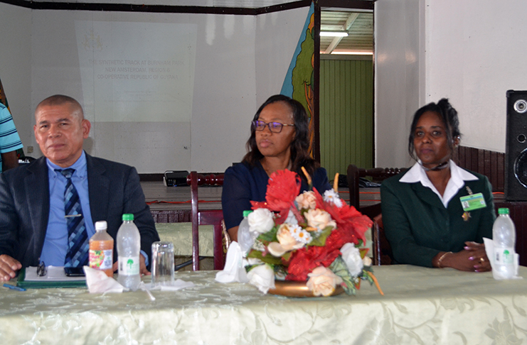 Minister George Norton, Attorney-at-Law Leslyn Charles and Assistant Director of Sport Melissa Dow-Richardson at the head table